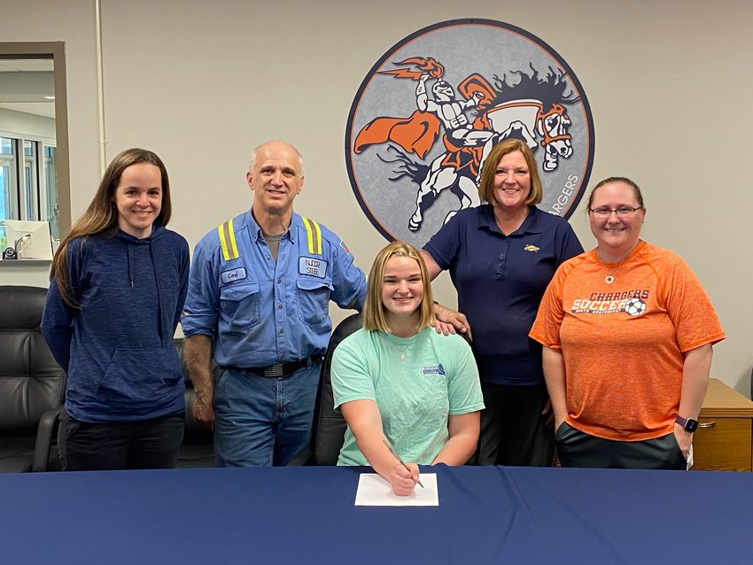Gracen Schwabe signs to continue her academic and soccer career with Johnson University. She is joined by her mom and dad as well Charger assistant coach Bailey Carpenter and head coach Julie Hodges.